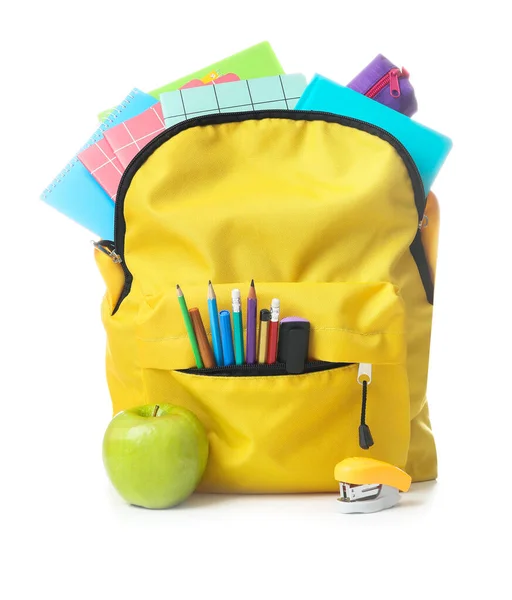 School backpack with stationery on white background — Stock Photo, Image