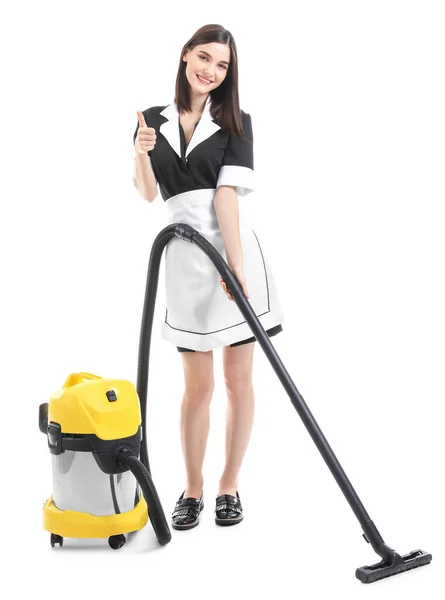 Portrait of beautiful chambermaid with vacuum cleaner on white background — Stock Photo, Image