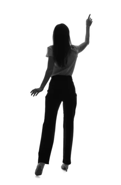 Silhouette de femme d'affaires pointant quelque chose sur fond blanc. Concept de choix — Photo