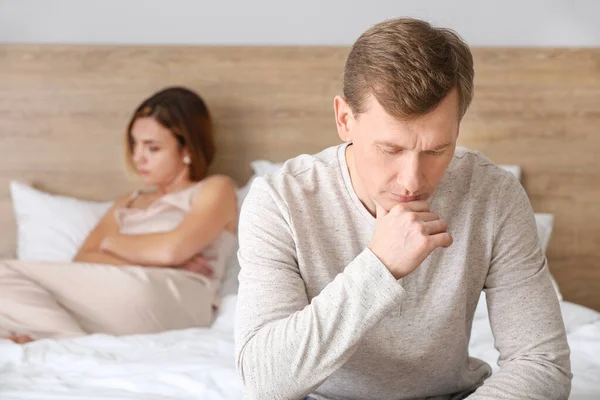 Sad couple after quarrel in bedroom — Stock Photo, Image