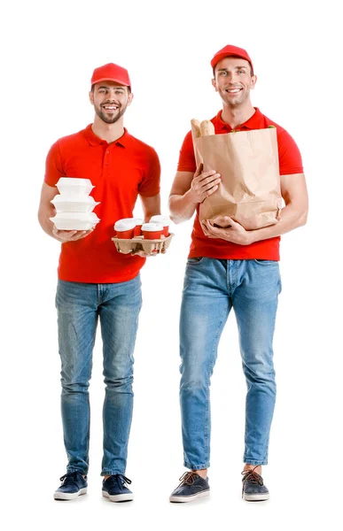 Trabalhadores bonitos do serviço de entrega de alimentos no fundo branco — Fotografia de Stock