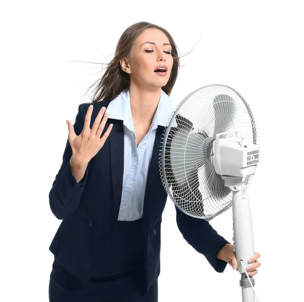 Young woman with electric fan on white background — Stock Photo, Image
