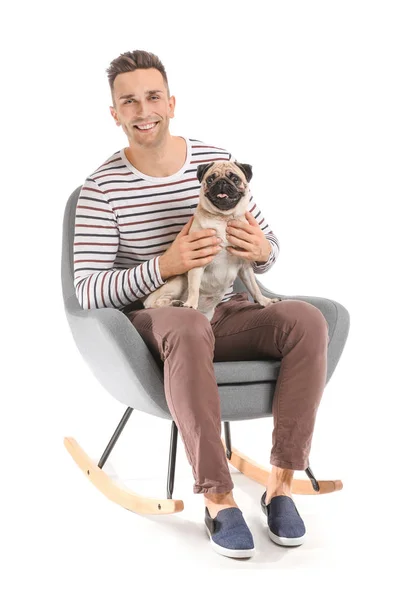 Handsome man with cute pug dog on white background — Stock Photo, Image