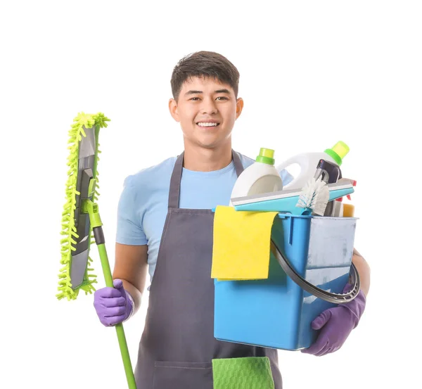 Asian janitor with cleaning supplies on white background — Stock Photo, Image