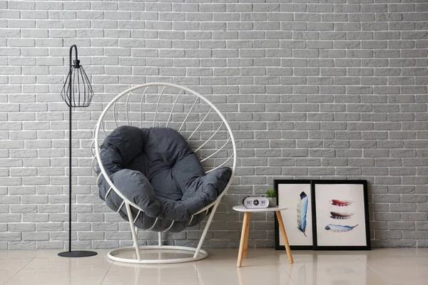 Interior of modern room with comfortable armchair near color wall — Stok fotoğraf