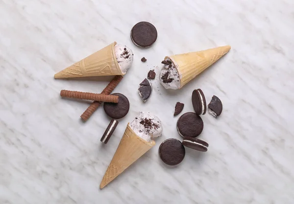 Tasty ice-cream and chocolate cookies on white background — Stock Photo, Image