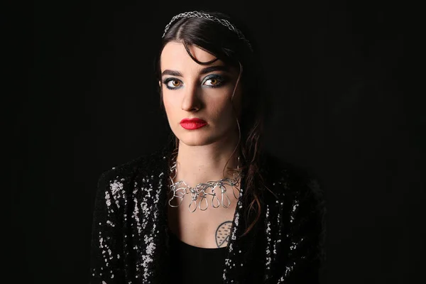 Beautiful fashionable woman on dark background — 스톡 사진