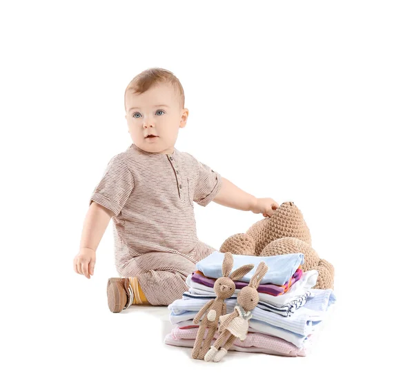 Cute baby with stylish clothes and toys on white background — Stock Photo, Image