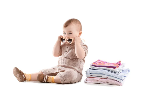 Aranyos baba elegáns ruhák fehér háttér — Stock Fotó