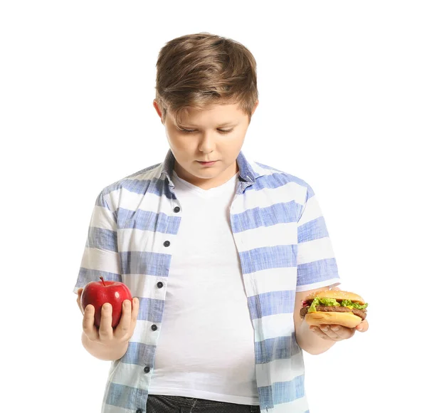 Túlsúlyos Fiú Almával Hamburgerrel Fehér Háttéren — Stock Fotó