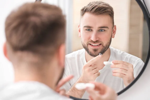 Young Man Putting Contact Lenses Mirror — Stock Photo, Image