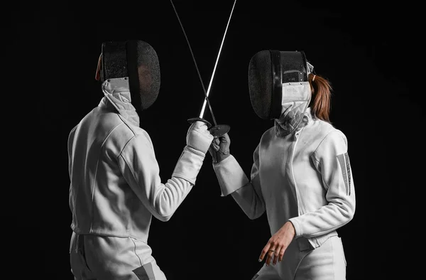 Young Fencers Dark Background — Stock Photo, Image