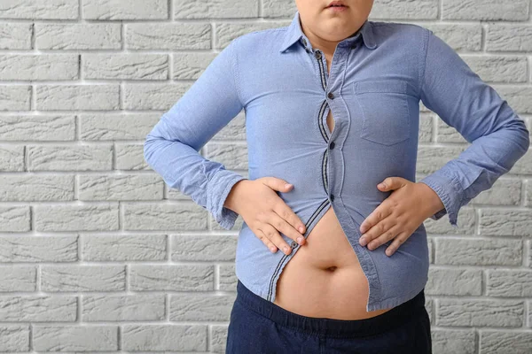 Overweight Boy Tight Clothes Brick Wall — Stock Photo, Image