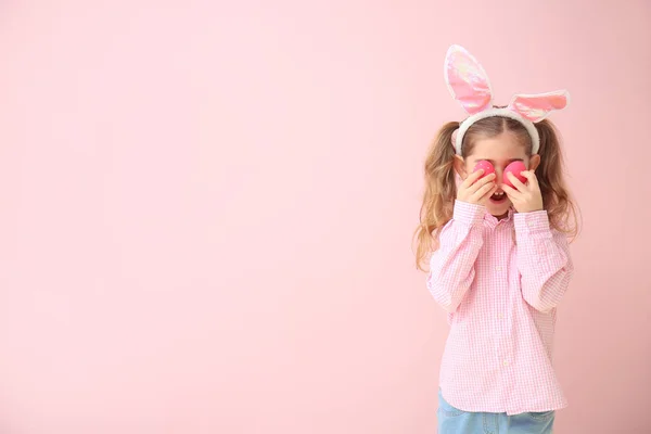 Little Girl Easter Eggs Bunny Ears Color Background — Stock Photo, Image