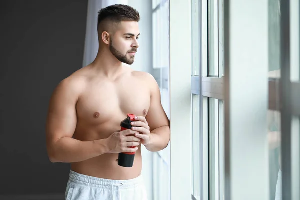 Sporty Man Protein Shake Window — Stock Photo, Image