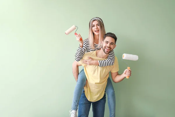 Young Couple Paint Rollers Color Wall New Apartment — Stock Photo, Image