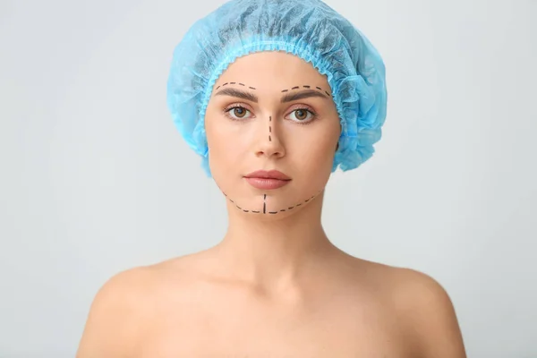 Young Woman Marks Her Face Light Background Concept Plastic Surgery — Stock Photo, Image