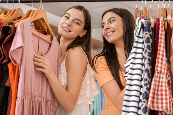 Young Women Choosing Clothes Modern Store — Stok fotoğraf