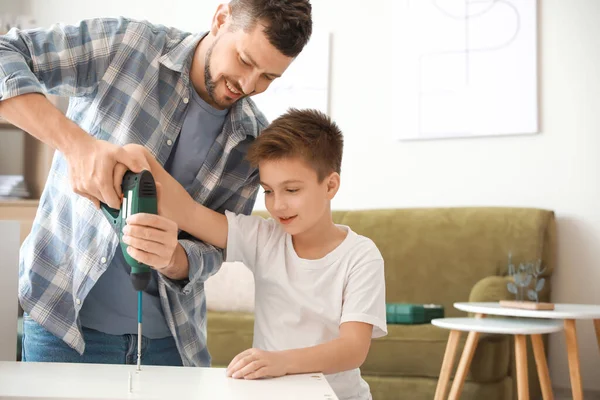 Father His Little Son Assembling Furniture Home — Stock Photo, Image