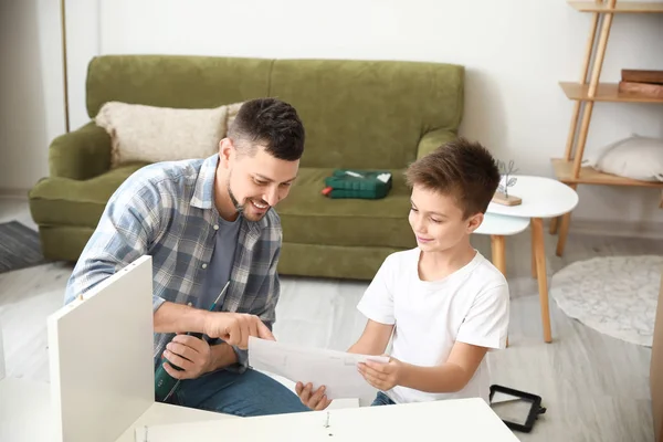 Father His Little Son Assembling Furniture Home — Stock Photo, Image