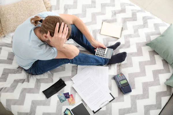 Worried Young Man Debt Home Top View — Stock Photo, Image