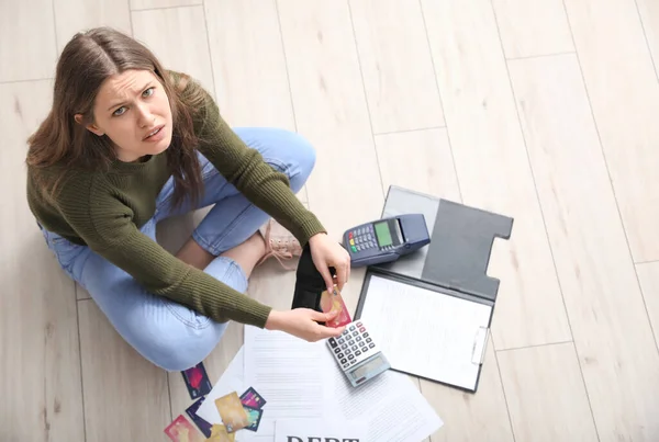 Worried Young Woman Debt Home Top View — Stock Photo, Image