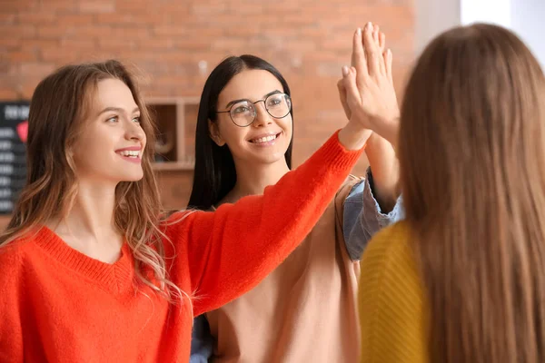 Beautiful Young Businesswomen Putting Hands Together Office — Stock Photo, Image