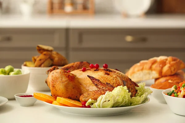 Tasty baked turkey for Thanksgiving day on table