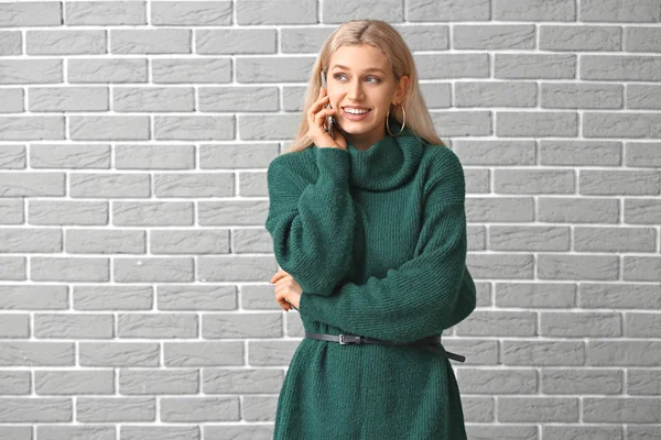 Beautiful Young Woman Warm Sweater Talking Phone Brick Background — Stock Photo, Image