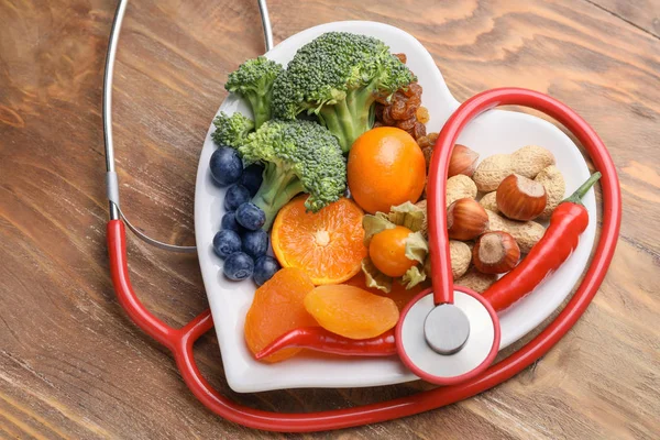 Plate Healthy Products Stethoscope Wooden Table — Stock Photo, Image