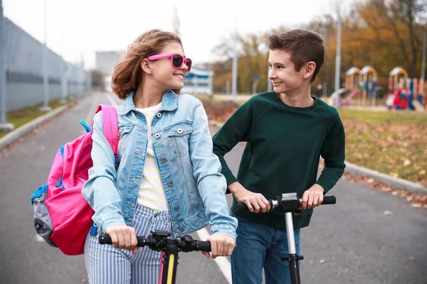 Active Teenagers Riding Kick Scooters Outdoors — Stock Photo, Image