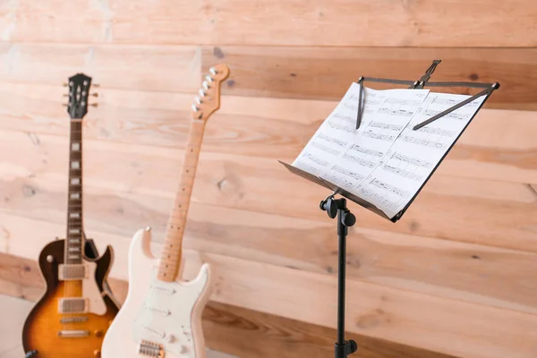 Modern Guitars Note Stand Wooden Wall — Stock Photo, Image