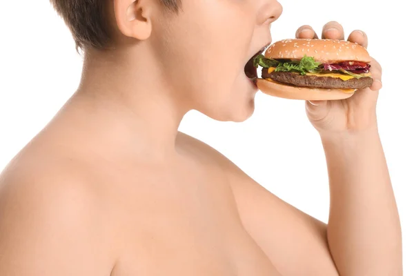 Chico Con Sobrepeso Comiendo Hamburguesa Sobre Fondo Blanco — Foto de Stock