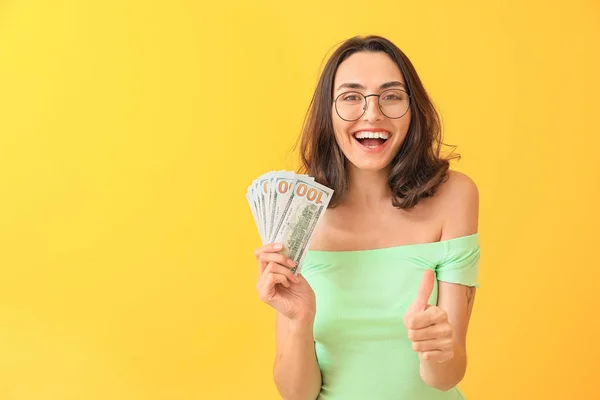 Beautiful Young Woman Money Showing Thumb Color Background — Stock Photo, Image