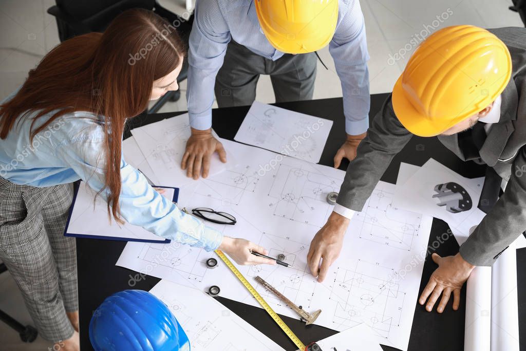 Group of engineers working in office