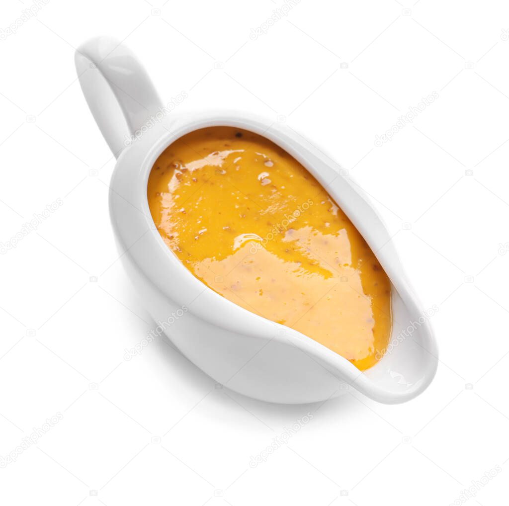 Gravy boat of tasty honey mustard sauce on white background