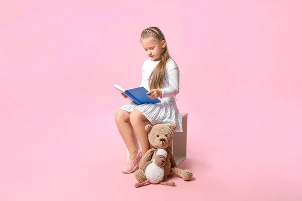 Cute Little Girl Reading Book Color Background — Stock Photo, Image