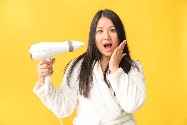 Surprised Asian Woman Hair Dryer Color Background — Stock Photo, Image