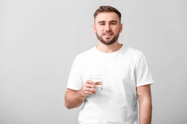 Young Man Glass Water Light Background — Stock Photo, Image