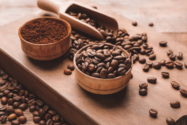 Composition with coffee beans on wooden background