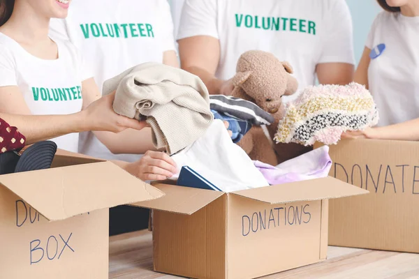 Team Volunteers Donations Poor People Indoors — Stock Photo, Image