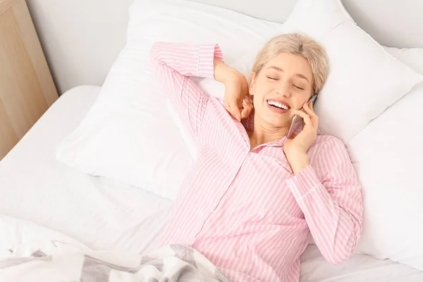 Young Woman Talking Mobile Phone Bedroom — Stock Photo, Image