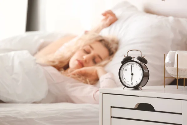 Alarm Clock Table Sleeping Young Woman Bedroom — Stock Photo, Image