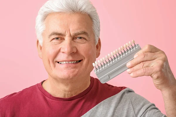 Senior Man Teeth Color Samples Pink Background — Stock Photo, Image
