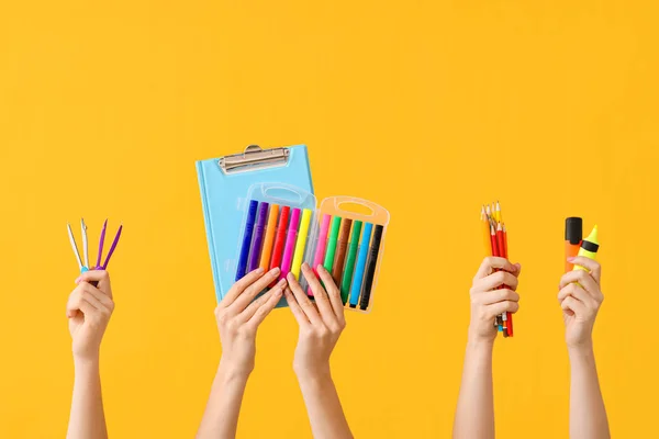 Many Hands School Supplies Color Background — Stock Photo, Image