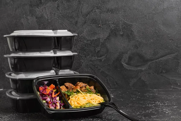 Containers with healthy food on dark background — Stock Image Containers Healthy Food Dark Background Stock Picture