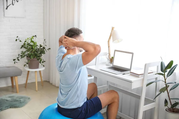 Man Sitting Fitness Ball While Working Home — Stock Photo, Image