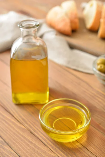 Bowl Bottle Tasty Olive Oil Wooden Table — Stock Photo, Image