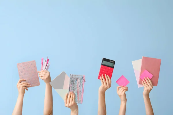 Many Hands School Supplies Color Background — Stock Photo, Image