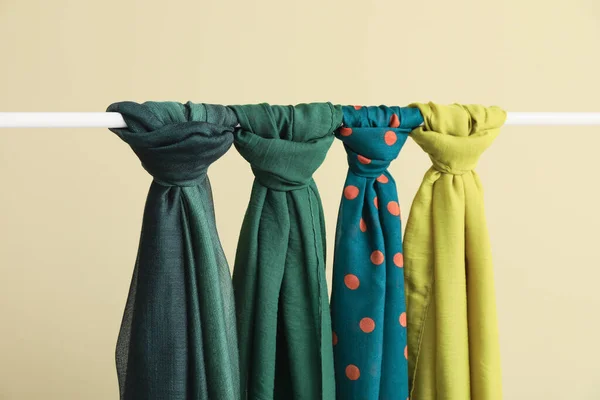 Different Beautiful Scarves Hanging Rack — Stock Photo, Image